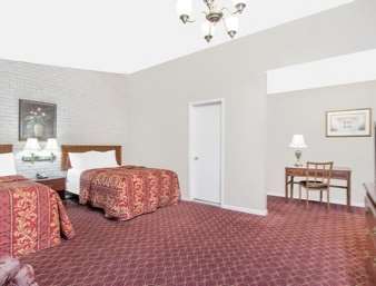 Travelodge Inn & Suites Латам Номер фото